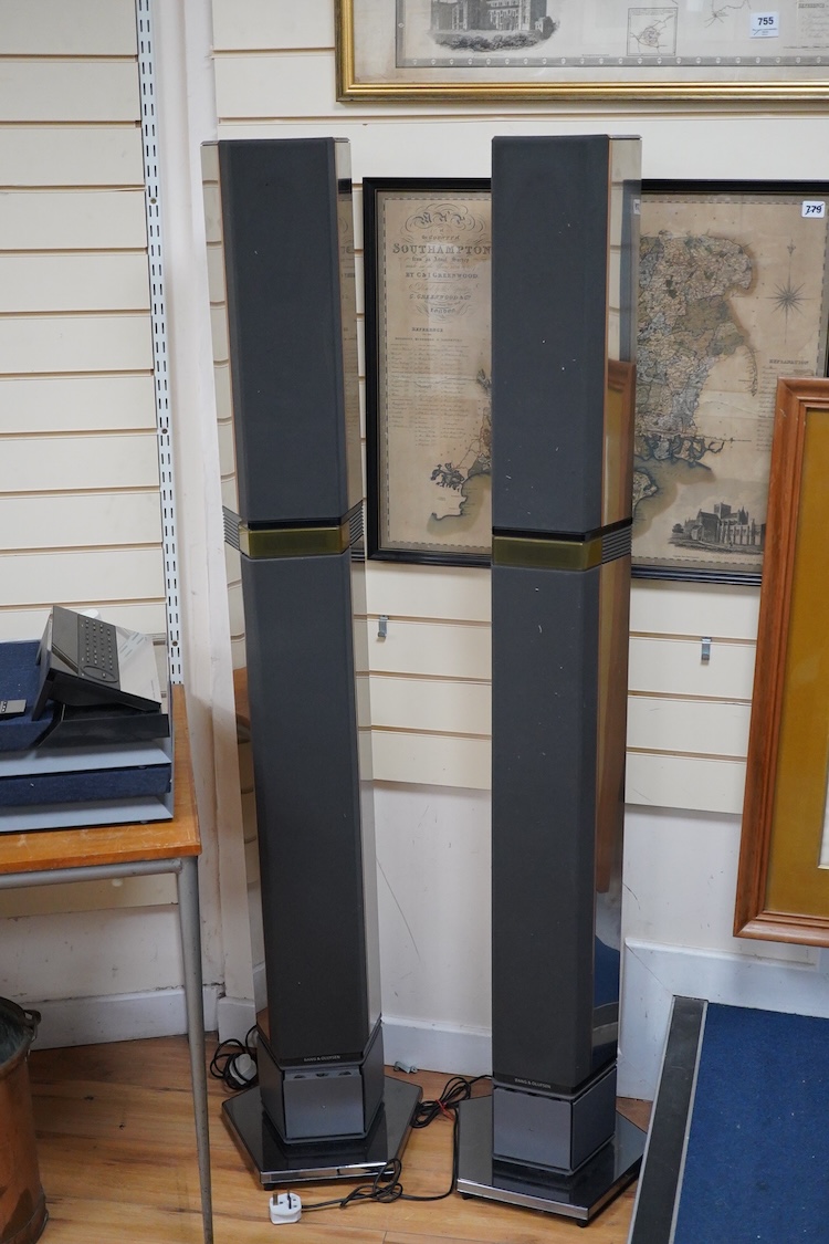 A Bang and Olufsen 6500 hi-fi system, comprising of a Beocord 6500, a Beogram CD 6500, a Beomaster 6500, and a master control panel, together with a pair of floor standing pedestal speakers, 164cm high, and pair of type